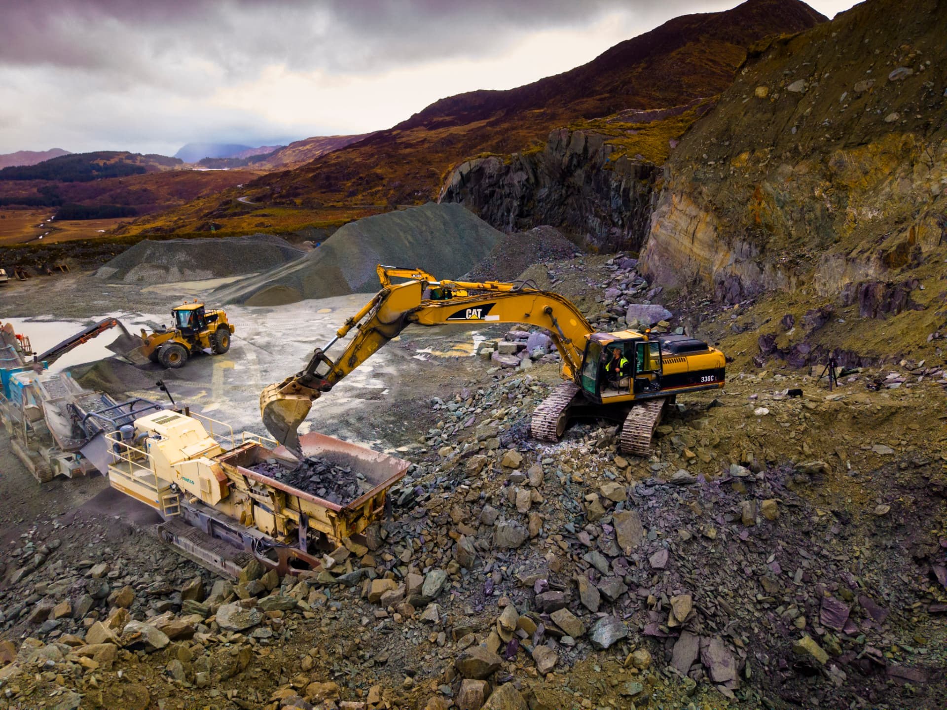 Aerial view of a digger loading a crusher at the Healy-Rae quarry in Kerry